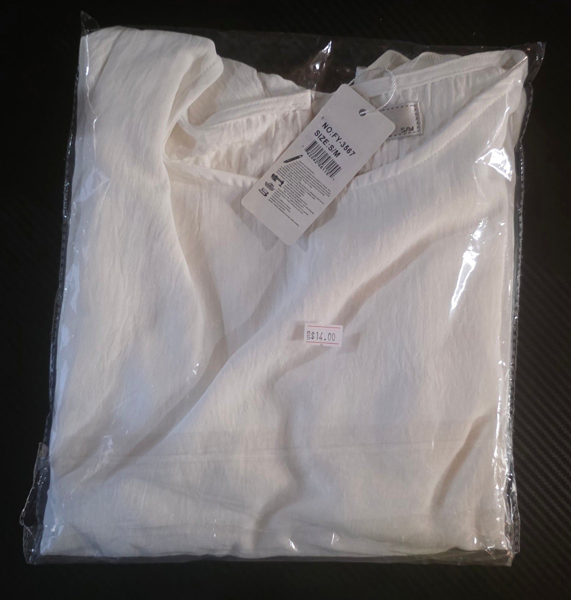 Blusa de Verano Cuello Redondo con Manga de Volantes – 65% Políster / 35% Algodón