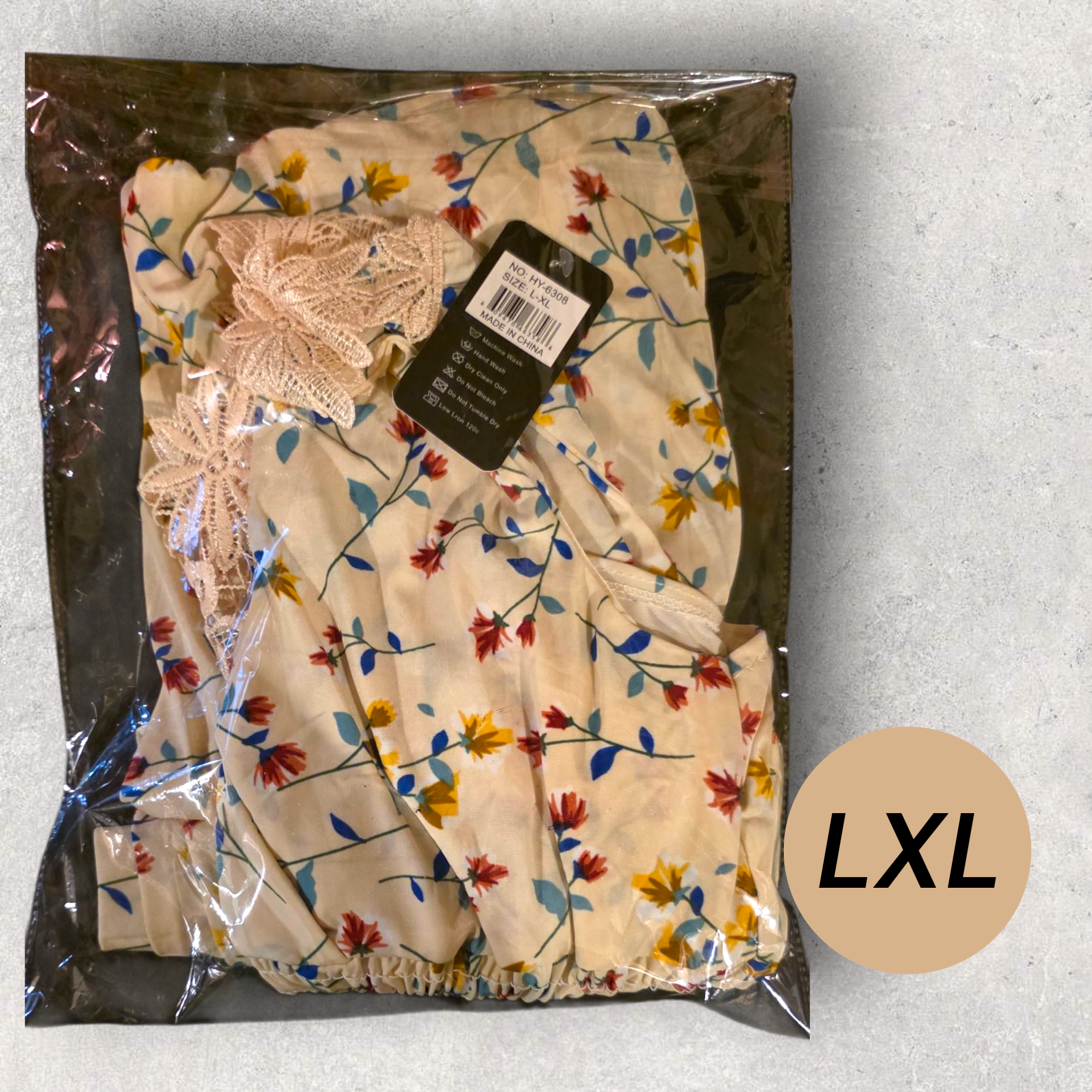 Enterizo Floral de Manga Corta – 65% Poliéster / 35% Spandex