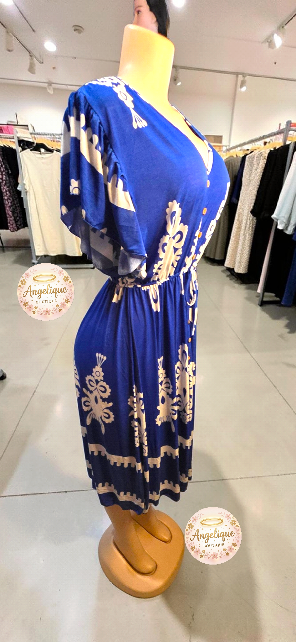 Vestido Midi Floral – 55% Algodón / 45% Poliéster