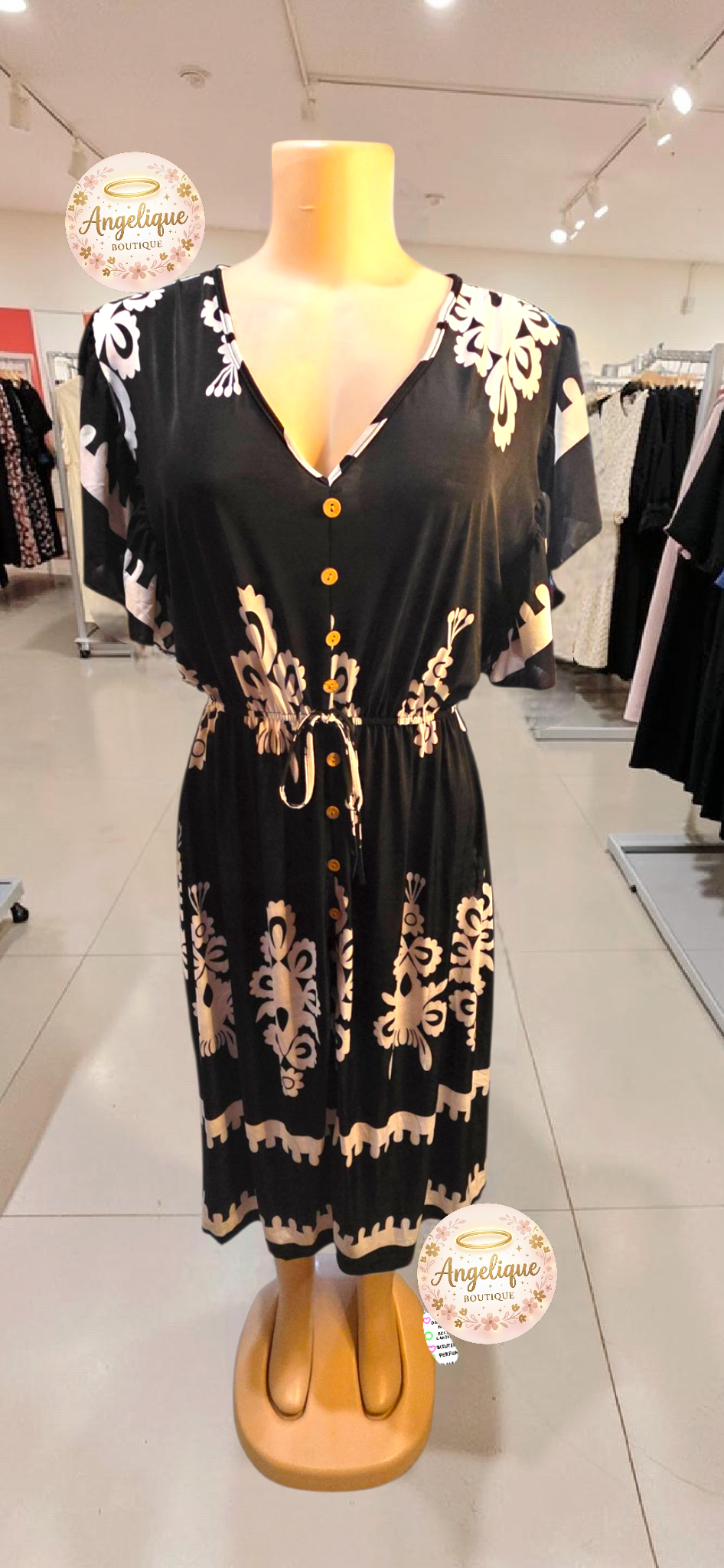 Vestido Midi Floral – 55% Algodón / 45% Poliéster
