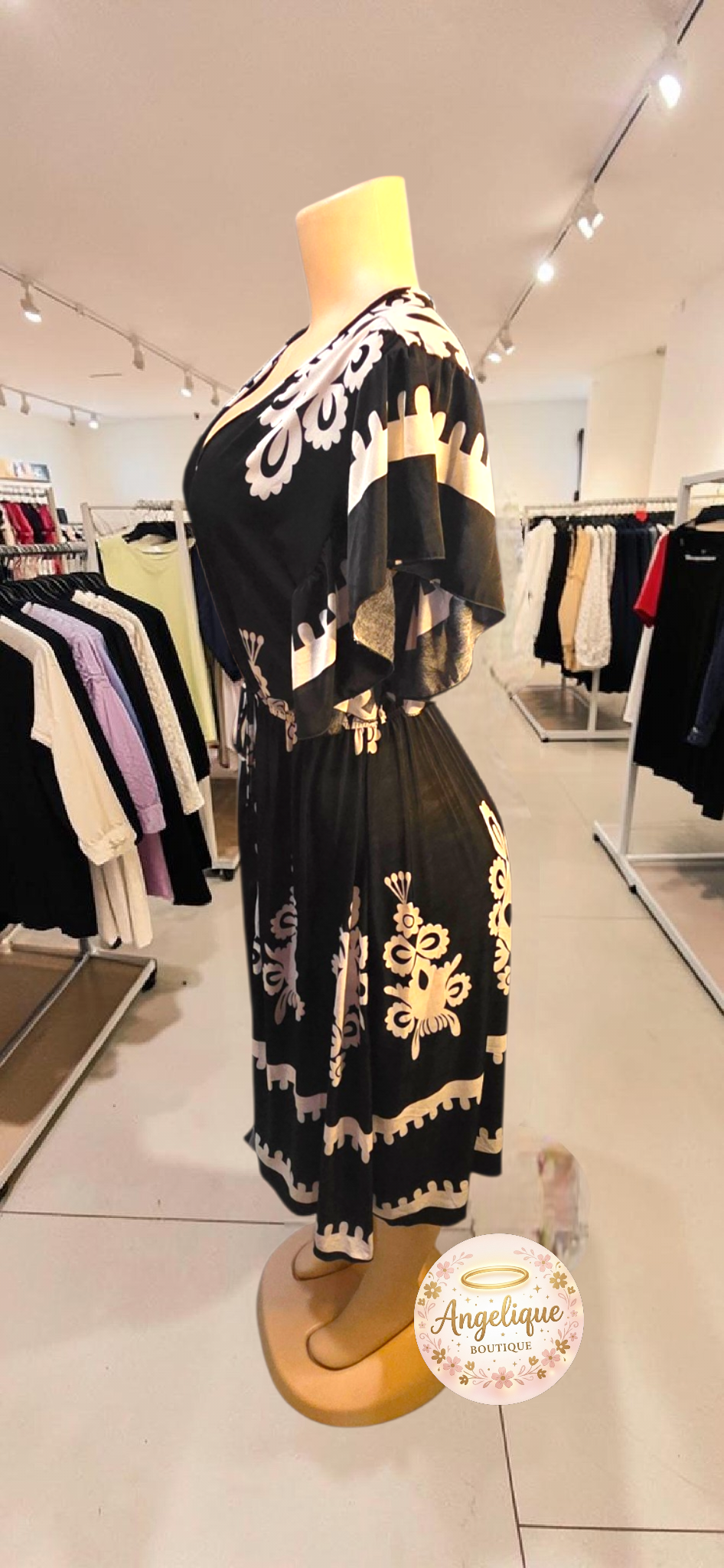 Vestido Midi Floral – 55% Algodón / 45% Poliéster