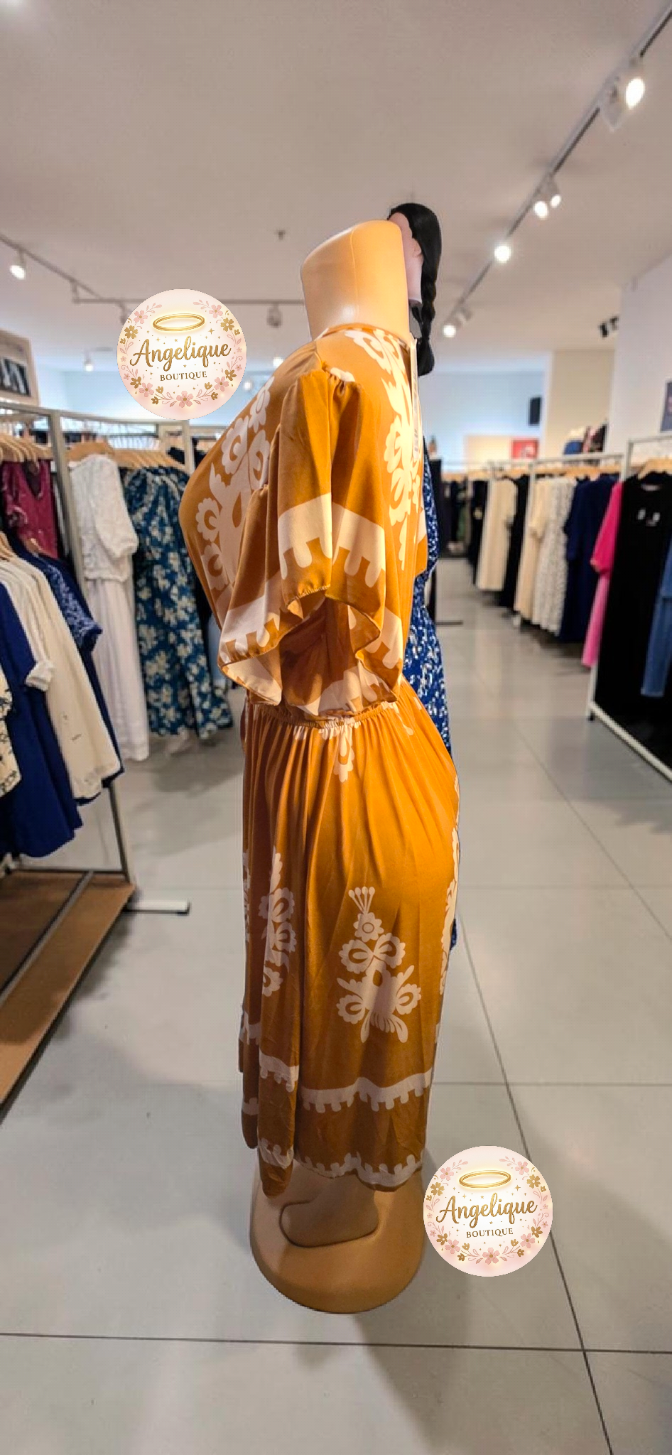 Vestido Midi Floral – 55% Algodón / 45% Poliéster