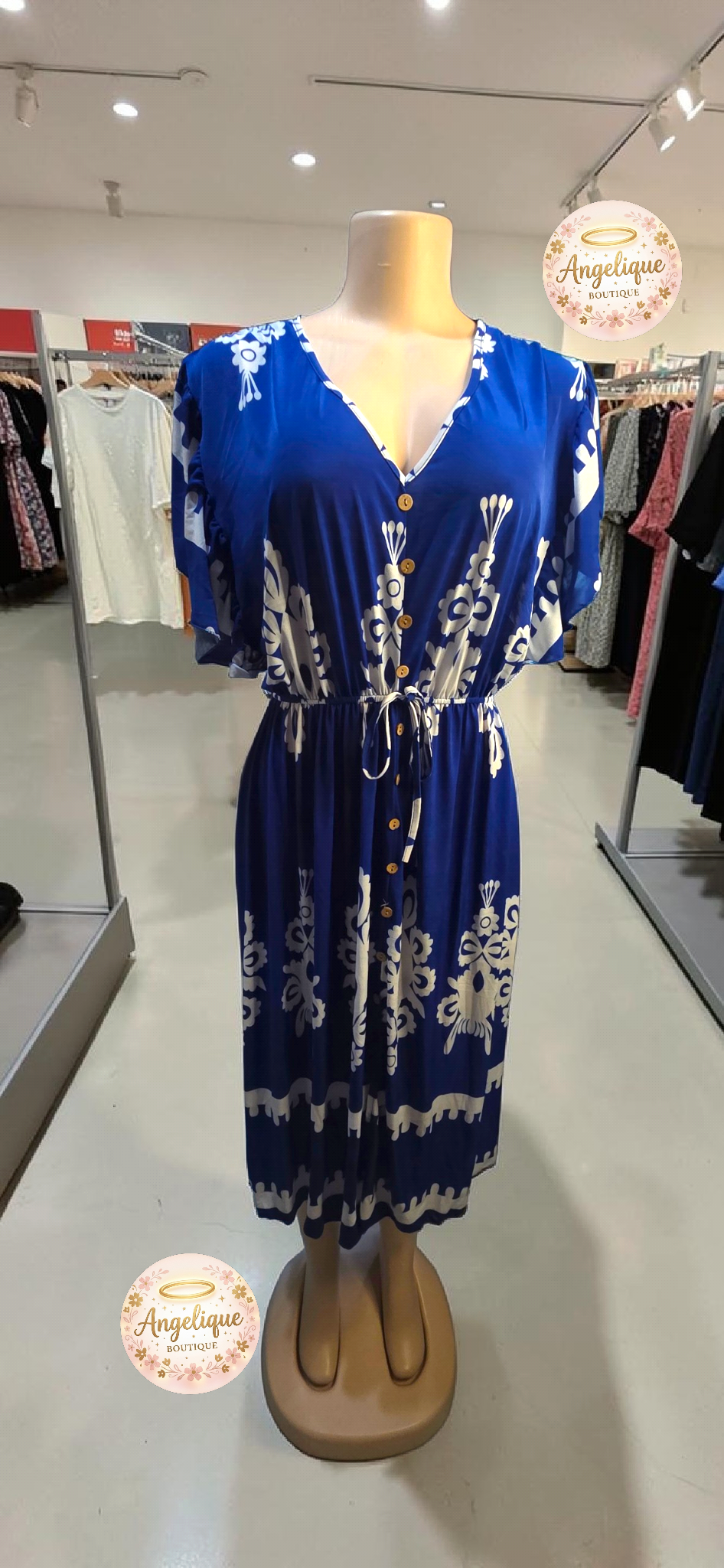 Vestido Midi Floral – 55% Algodón / 45% Poliéster
