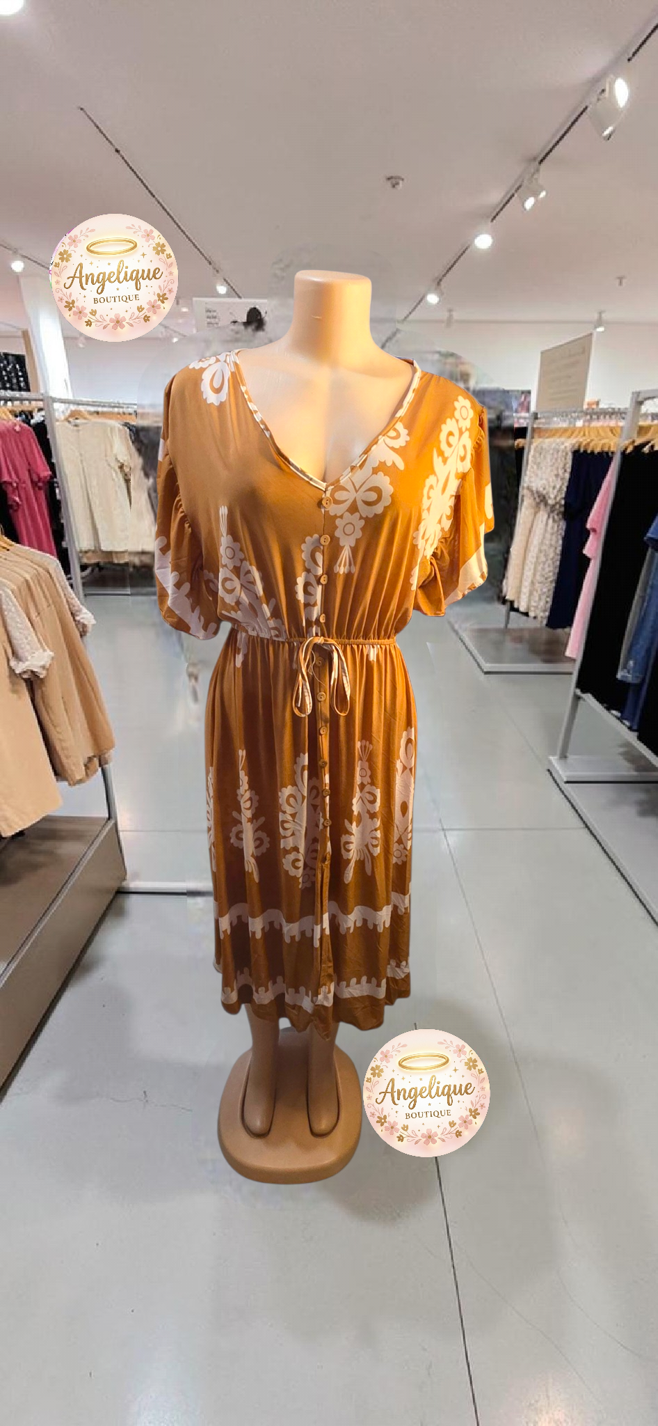 Vestido Midi Floral – 55% Algodón / 45% Poliéster
