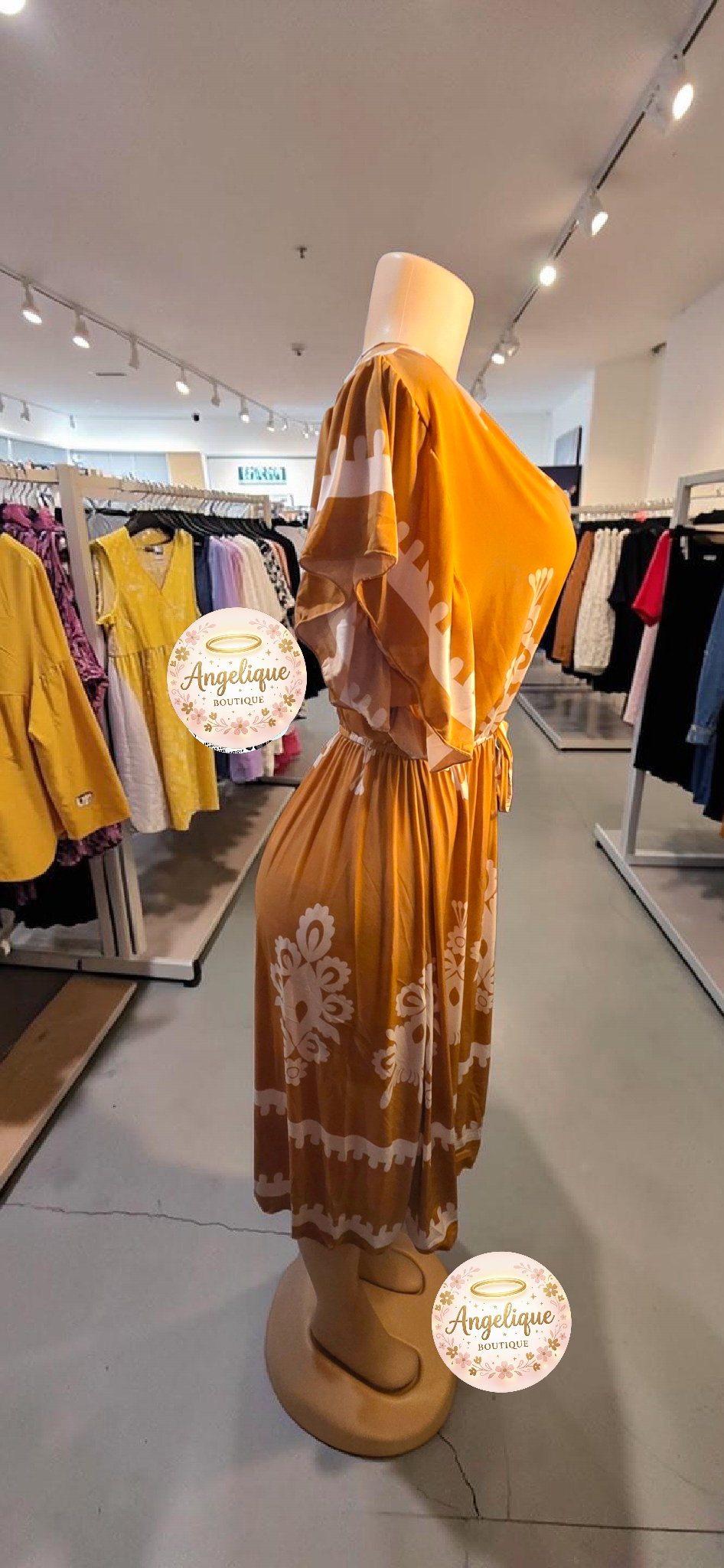 Vestido Midi Floral – 55% Algodón / 45% Poliéster