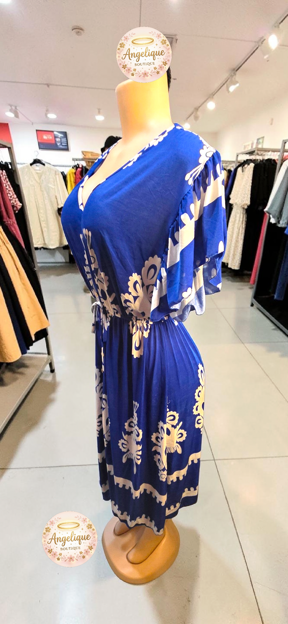 Vestido Midi Floral – 55% Algodón / 45% Poliéster